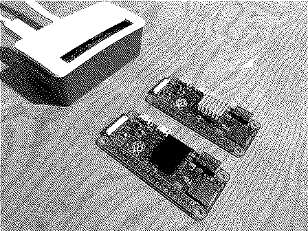 The Raspberry Pi Zero with two backup Pis beside it