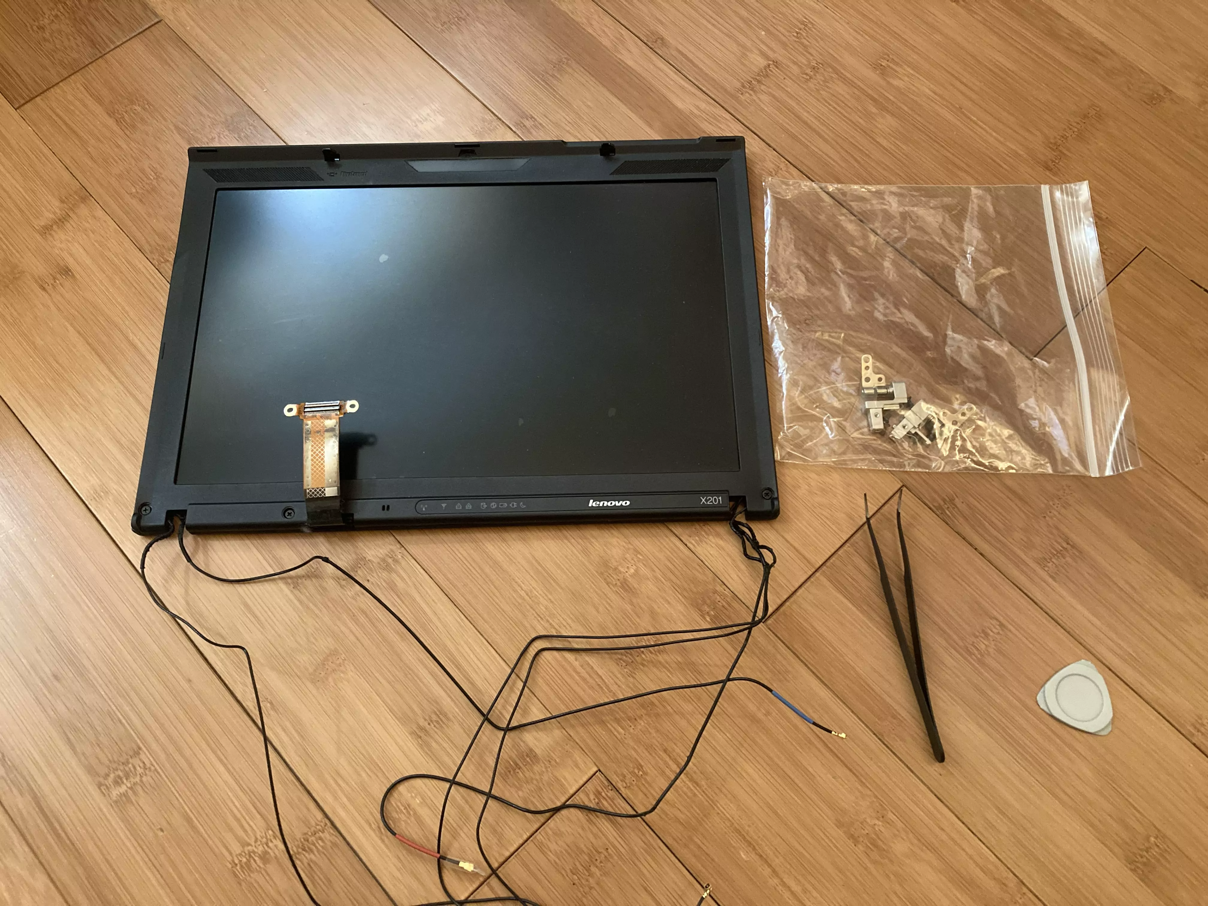 The main X201 display and lid disconnected